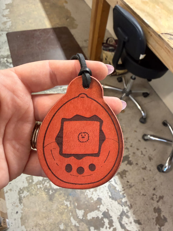 Garage Sale: Tamagotchi Bag Tag 👾