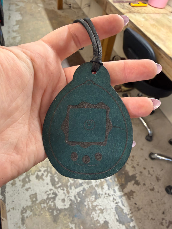 Garage Sale: Tamagotchi Bag Tag 👾
